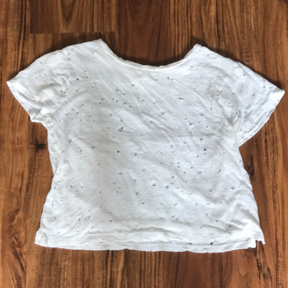 Aeropostale: white; circular cut out holes